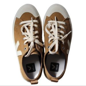 French low-top sneakers by Veja in brown suede
